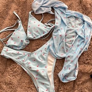 Flower blue swimsuit includes the body wrap